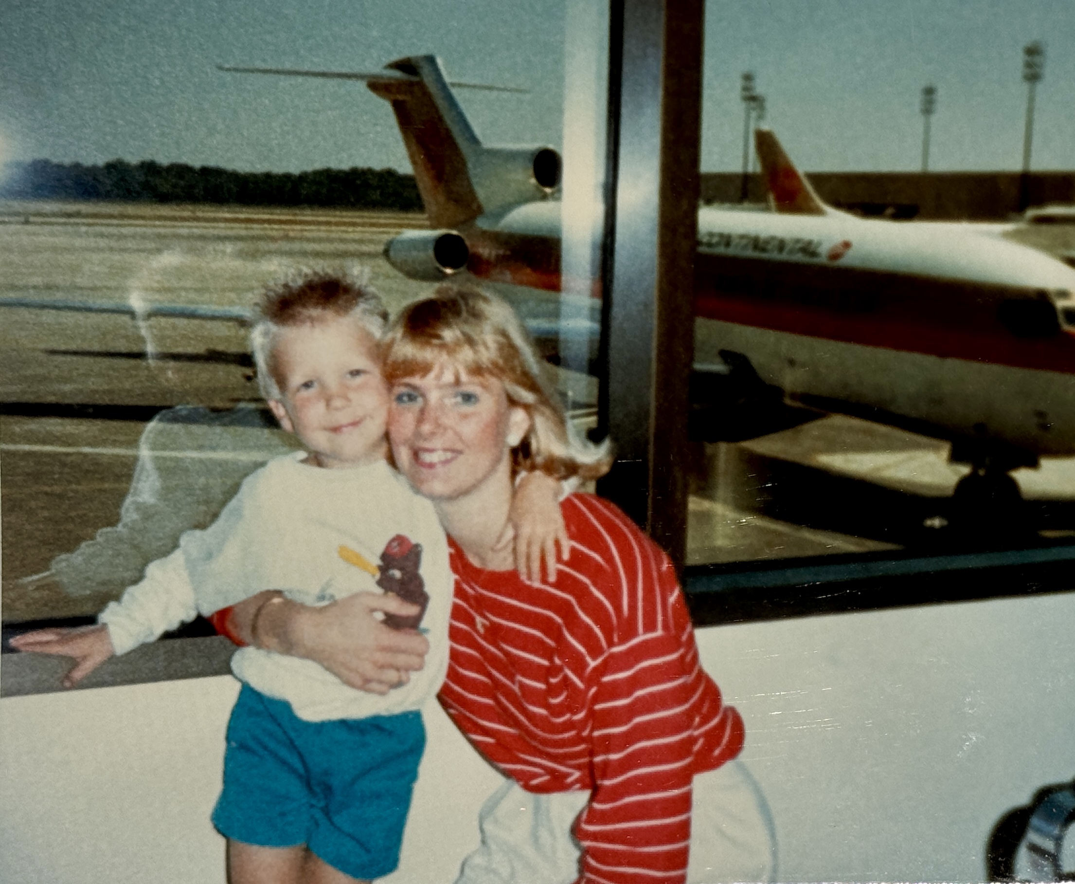 Young Dan at the airport — a lifelong love of air travel
